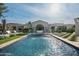 Inviting pool with fountain features and spacious patio area at 9290 E Thompson Peak Pkwy # 422, Scottsdale, AZ 85255