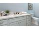 Modern bathroom with white vanity, quartz countertop, and updated fixtures at 10226 N 171St Dr, Waddell, AZ 85355