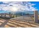 Modern home behind a sleek metal gate, showcasing curb appeal at 10226 N 171St Dr, Waddell, AZ 85355