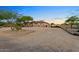 Single-story home with desert landscaping and a large driveway at 103 W Tanya Rd, Phoenix, AZ 85086