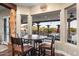 Kitchen nook with a round table and chairs, overlooking the pool at 103 W Tanya Rd, Phoenix, AZ 85086