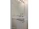 Simple bathroom with a white vanity, a large mirror, and chrome fixtures at 10426 N 11Th St # 3, Phoenix, AZ 85020