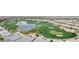 Golf course community with lake and homes at 1175 E Copper Holw, Queen Creek, AZ 85140