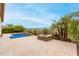 Peaceful backyard with pool, fire pit, and stunning views at 1175 E Copper Holw, Queen Creek, AZ 85140