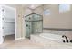 Spa-like bathroom with soaking tub and glass shower at 1175 E Copper Holw, Queen Creek, AZ 85140