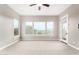 Well-lit bedroom featuring a door to the backyard at 1175 E Copper Holw, Queen Creek, AZ 85140