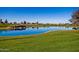 Scenic golf course with pond and lush landscaping at 1175 E Copper Holw, Queen Creek, AZ 85140