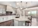 Modern kitchen with granite countertops and stainless steel appliances at 1175 E Copper Holw, Queen Creek, AZ 85140