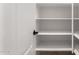 Bright and spacious pantry with ample shelving at 1175 E Copper Holw, Queen Creek, AZ 85140