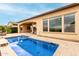 Clear blue pool surrounded by a large patio area at 1175 E Copper Holw, Queen Creek, AZ 85140