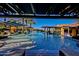 Expansive pool area with lounge chairs and bar at 1175 E Copper Holw, Queen Creek, AZ 85140