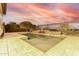 Relaxing pool area with a waterfall feature and stone accents at 1175 E Copper Holw, Queen Creek, AZ 85140