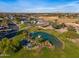 Residential area with pond and distant mountains at 1233 E Salado Cir, Mesa, AZ 85203