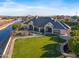 Luxury home with a large backyard, pool, and canal view at 1233 E Salado Cir, Mesa, AZ 85203