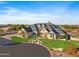 Stunning property showcasing a large home and beautifully manicured lawn at 1233 E Salado Cir, Mesa, AZ 85203