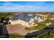 Luxury home with a large yard, pool, and basketball court at 1233 E Salado Cir, Mesa, AZ 85203