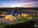 Spacious home with a large yard and basketball court; serene sunset view at 1233 E Salado Cir, Mesa, AZ 85203