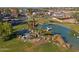 Residential area with pond and distant mountains at 1233 E Salado Cir, Mesa, AZ 85203