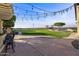 Large backyard with string lights and a view at 1233 E Salado Cir, Mesa, AZ 85203