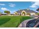 Luxury home with expansive backyard, sparkling pool, and lush lawn at 1233 E Salado Cir, Mesa, AZ 85203