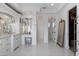 Bright and airy bathroom featuring a double vanity and large mirror at 1233 E Salado Cir, Mesa, AZ 85203