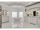 Spacious bathroom with double vanities and hexagon tile floors at 1233 E Salado Cir, Mesa, AZ 85203