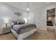 Comfortable bedroom with a queen-size bed and en-suite bathroom at 1233 E Salado Cir, Mesa, AZ 85203