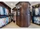 Large walk-in closet with ample shelving and hanging space at 1233 E Salado Cir, Mesa, AZ 85203