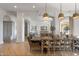 Elegant dining room featuring a large wooden table and comfortable seating at 1233 E Salado Cir, Mesa, AZ 85203