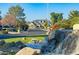 Elegant home with landscaping and a water feature at 1233 E Salado Cir, Mesa, AZ 85203