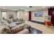 Basement home theater with large screen, comfortable seating and projector at 1233 E Salado Cir, Mesa, AZ 85203