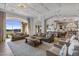 Open living area with views of backyard and kitchen at 1233 E Salado Cir, Mesa, AZ 85203