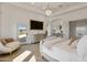 Luxurious main bedroom with large TV and sitting area at 1233 E Salado Cir, Mesa, AZ 85203