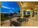 Relaxing patio area with seating and a view of the pool at 1233 E Salado Cir, Mesa, AZ 85203