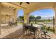 Outdoor dining area with iron table and chairs at 1233 E Salado Cir, Mesa, AZ 85203