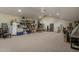 Large storage or workshop area with shelving and various items at 1233 E Salado Cir, Mesa, AZ 85203