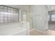 Main bathroom with shower and bathtub at 12821 W Whitton Ave, Avondale, AZ 85392