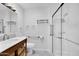 Bathroom with modern vanity and walk-in shower at 13227 N 110Th Ave, Sun City, AZ 85351
