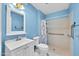 Bathroom with walk-in shower and grab bars at 13227 N 110Th Ave, Sun City, AZ 85351