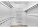 Large closet with shelving and hanging rod at 13227 N 110Th Ave, Sun City, AZ 85351