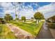 Landscaped community grounds with walkways at 13227 N 110Th Ave, Sun City, AZ 85351