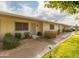 Front view of a light beige single-story building with landscaping and walkways at 13227 N 110Th Ave, Sun City, AZ 85351