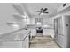 Modern kitchen with stainless steel appliances and granite countertops at 13227 N 110Th Ave, Sun City, AZ 85351