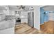 Modern kitchen with stainless steel appliances and granite countertops at 13227 N 110Th Ave, Sun City, AZ 85351
