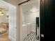 Convenient laundry room with washer, dryer, and a barn door at 1425 E Desert Cove Ave # 24, Phoenix, AZ 85020