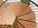 Overhead view of a modern wooden spiral staircase at 1425 E Desert Cove Ave # 24, Phoenix, AZ 85020