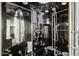 Modern shower unit features a variety of shower heads and built in controls at 15240 N 51St St, Scottsdale, AZ 85254