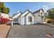 Front view of a charming house with a rock front yard and neutral color scheme at 1535 N Horne -- # 105, Mesa, AZ 85203