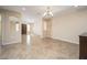 Spacious living room with neutral walls, tile flooring and recessed lighting at 15834 N Nicklaus Ln, Sun City, AZ 85351