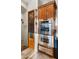 Modern kitchen with double ovens and custom cabinetry at 19711 W Georgia Ave, Litchfield Park, AZ 85340